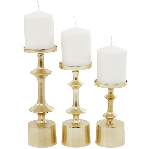 CosmoLiving by Cosmopolitan Aluminum Metal Decorative Candle Holder Pillar Candle Stand, Set of 3 Candlestick Holder 11", 9", 7" H, Gold - color: Gold