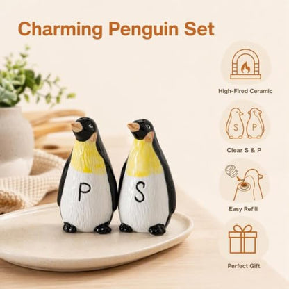 Ceramic Penguin Salt and Pepper Shakers Set Refillable Seasoning Dispensers | Set of 2 hand-painted ceramic penguin salt and pepper shakers with clear "S" and "P" labels and silicone stoppers.
