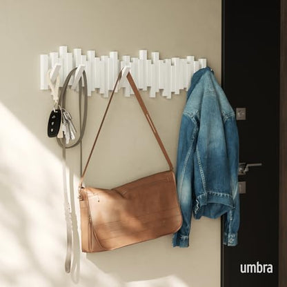 Umbra Sticks Wall Coat Rack, Wall Mount 8 Retractable Hooks, White | Modern sculptural look, holds five pounds each, fits entryways and bedrooms, easy to install, recycled plastic - color: White, size: 8-Hook