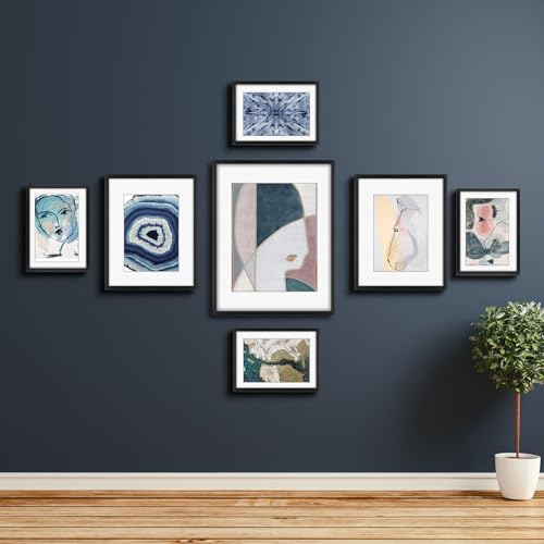 Frametory 7 Pack Aluminum Picture Frame with Mat for Gallery Wall, Black | Set includes one 11x14, two 8x10, four 5x7 frames with glass fronts, removable mats, and built-in hangers for wall mounting - color: Black