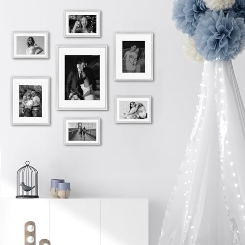 Frametory 7 Pack Aluminum Picture Frame with Mat for Gallery Wall, Silver | Set includes one 11x14, two 8x10, four 5x7 frames with glass fronts, removable mats, and built-in hangers for wall mounting - color: Silver