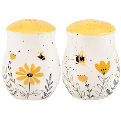 Primitives by Kathy Salt & Pepper Set - features bees buzzing over flowers with yellow accents. Shakers include unique openings to tell them apart, with plastic stoppers for easy refilling & cleaning