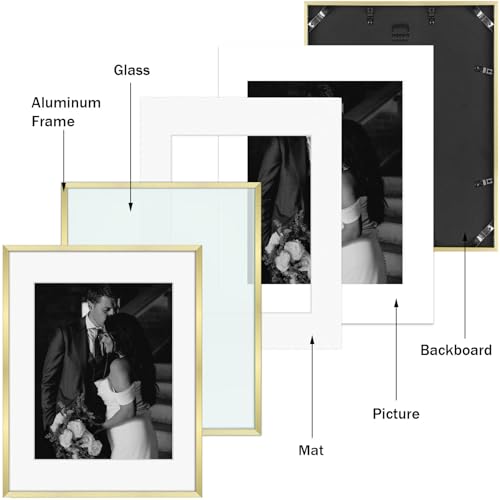 Frametory 7 Pack Aluminum Picture Frame with Mat for Gallery Wall, Gold | Set includes one 11x14, two 8x10, four 5x7 frames with glass fronts, removable mats, and built-in hangers for wall mounting - color: Gold