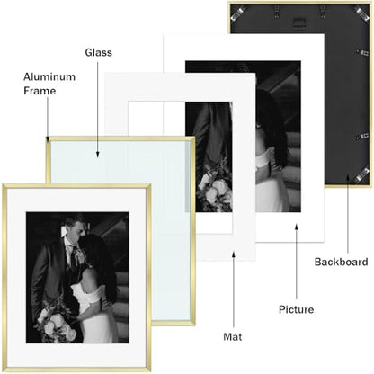 Frametory 7 Pack Aluminum Picture Frame with Mat for Gallery Wall, Gold | Set includes one 11x14, two 8x10, four 5x7 frames with glass fronts, removable mats, and built-in hangers for wall mounting - color: Gold