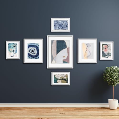 Frametory 7 Pack Aluminum Picture Frame with Mat for Gallery Wall, Silver | Set includes one 11x14, two 8x10, four 5x7 frames with glass fronts, removable mats, and built-in hangers for wall mounting - color: Silver