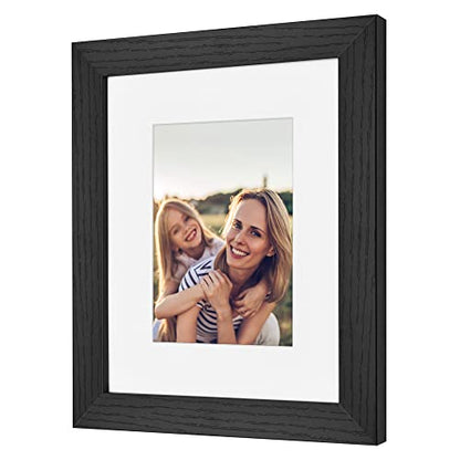 Americanflat 8x10 Picture Frame - Matted to 5x7 - Engineered Wood - Black | Shatter-resistant glass, wall or tabletop display with included easel, sawtooth hangers included, secure turn-tab backing - color: Black, size: 8x10