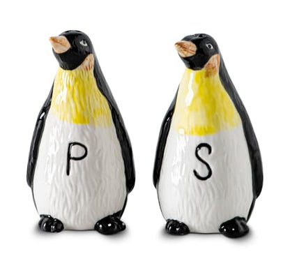 Ceramic Penguin Salt and Pepper Shakers Set Refillable Seasoning Dispensers | Set of 2 hand-painted ceramic penguin salt and pepper shakers with clear "S" and "P" labels and silicone stoppers.