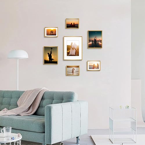 Frametory 7 Pack Aluminum Picture Frame with Mat for Gallery Wall, Bronze | Set includes one 11x14, two 8x10, four 5x7 frames with glass fronts, removable mats, and built-in hangers for wall mounting - color: Bronze