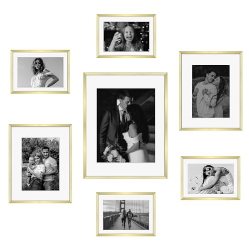 Frametory 7 Pack Aluminum Picture Frame with Mat for Gallery Wall, Gold | Set includes one 11x14, two 8x10, four 5x7 frames with glass fronts, removable mats, and built-in hangers for wall mounting - color: Gold