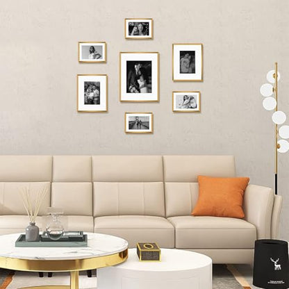 Frametory 7 Pack Aluminum Picture Frame with Mat for Gallery Wall, Bronze | Set includes one 11x14, two 8x10, four 5x7 frames with glass fronts, removable mats, and built-in hangers for wall mounting - color: Bronze