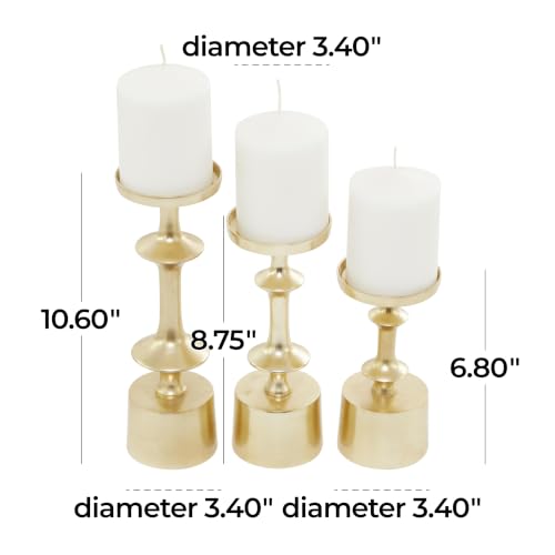 CosmoLiving by Cosmopolitan Aluminum Metal Decorative Candle Holder Pillar Candle Stand, Set of 3 Candlestick Holder 11", 9", 7" H, Gold - color: Gold