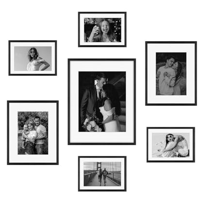 Frametory 7 Pack Aluminum Picture Frame with Mat for Gallery Wall, Black | Set includes one 11x14, two 8x10, four 5x7 frames with glass fronts, removable mats, and built-in hangers for wall mounting - color: Black