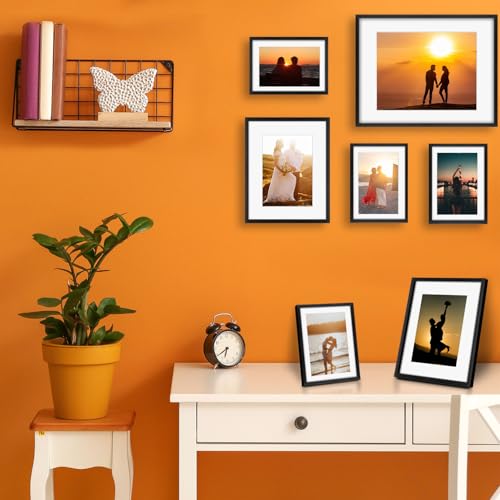 Frametory 7 Pack Aluminum Picture Frame with Mat for Gallery Wall, Black | Set includes one 11x14, two 8x10, four 5x7 frames with glass fronts, removable mats, and built-in hangers for wall mounting - color: Black