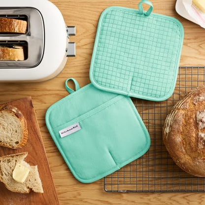 KITCHENAID Gourmet Series Gridlines Pot Holders 2-Pack Set, Heat Resistant up to 600°F, Soft Silicone Grip, Magnetic Cuff, Color of The Year, Spearmint, 8"x8" - color: Spearmint