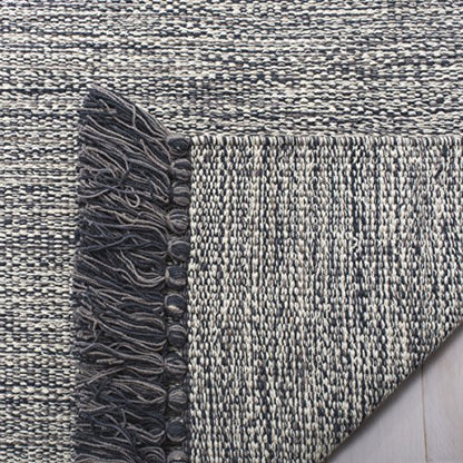 SAFAVIEH Montauk Collection Area Rug - 5' x 8', Grey, Handmade Tassel Cotton, Ideal for High Traffic Areas in Living Room, Bedroom (MTK610M) - color: Grey, size: 5' x 8' (Rectangular)